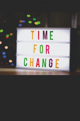 En skylt där det står "Time for change"